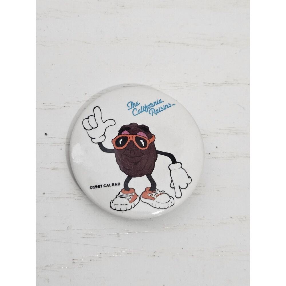 The California Raisins Vintage Button Pin Dancing Raisin Pinback White Red 1987‎